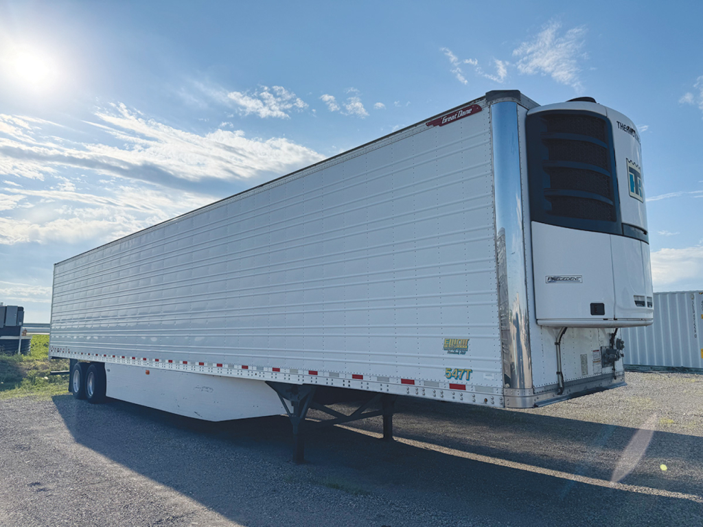 Great Dane Everest SS refrigerated trailer showing side label and ThermoKing refrigeration unit at front, rigid aluminum walls, dual rear axles visible.