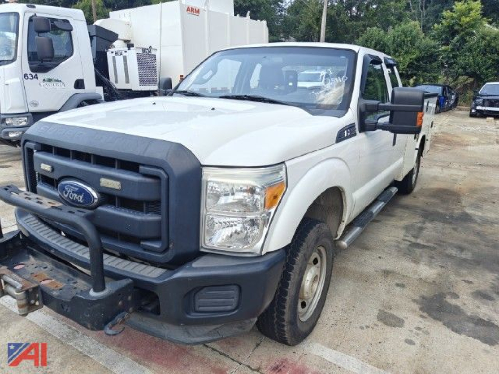 Ford F-250 Super Duty utility truck front-left view showing grille, bumper with brush guard, and side mirrors.