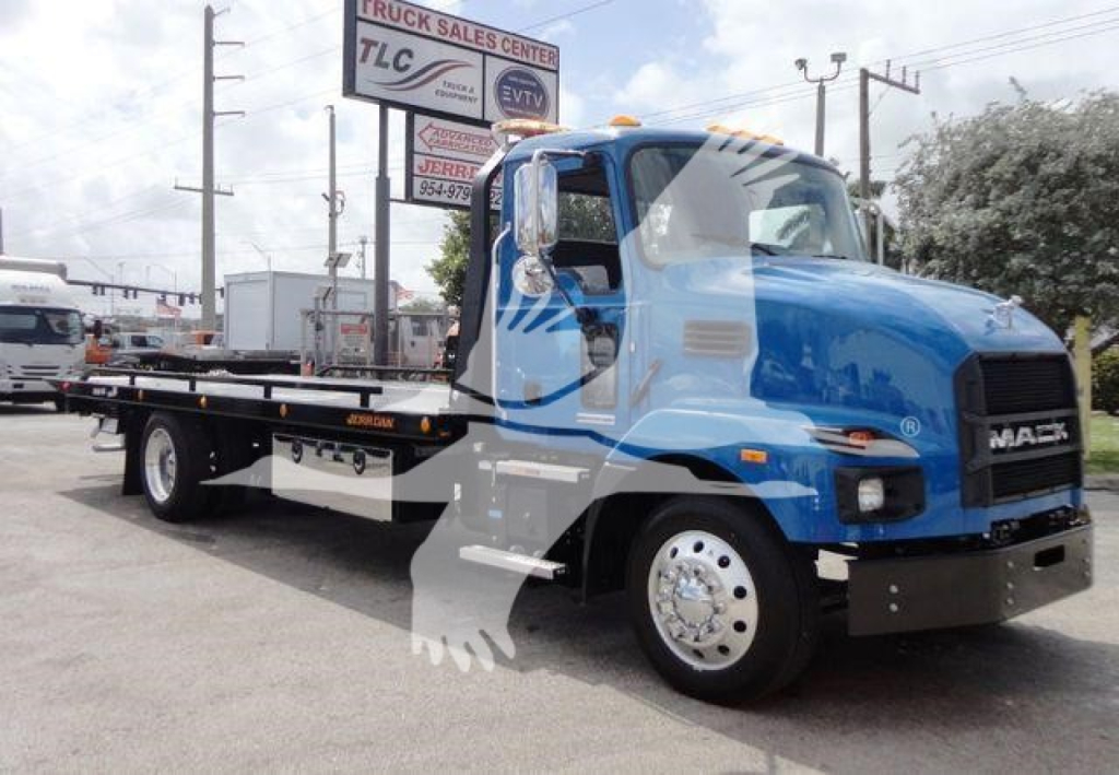Mack MD6 rollback truck in blue cab with flatbed, side view showing chassis and wheels.