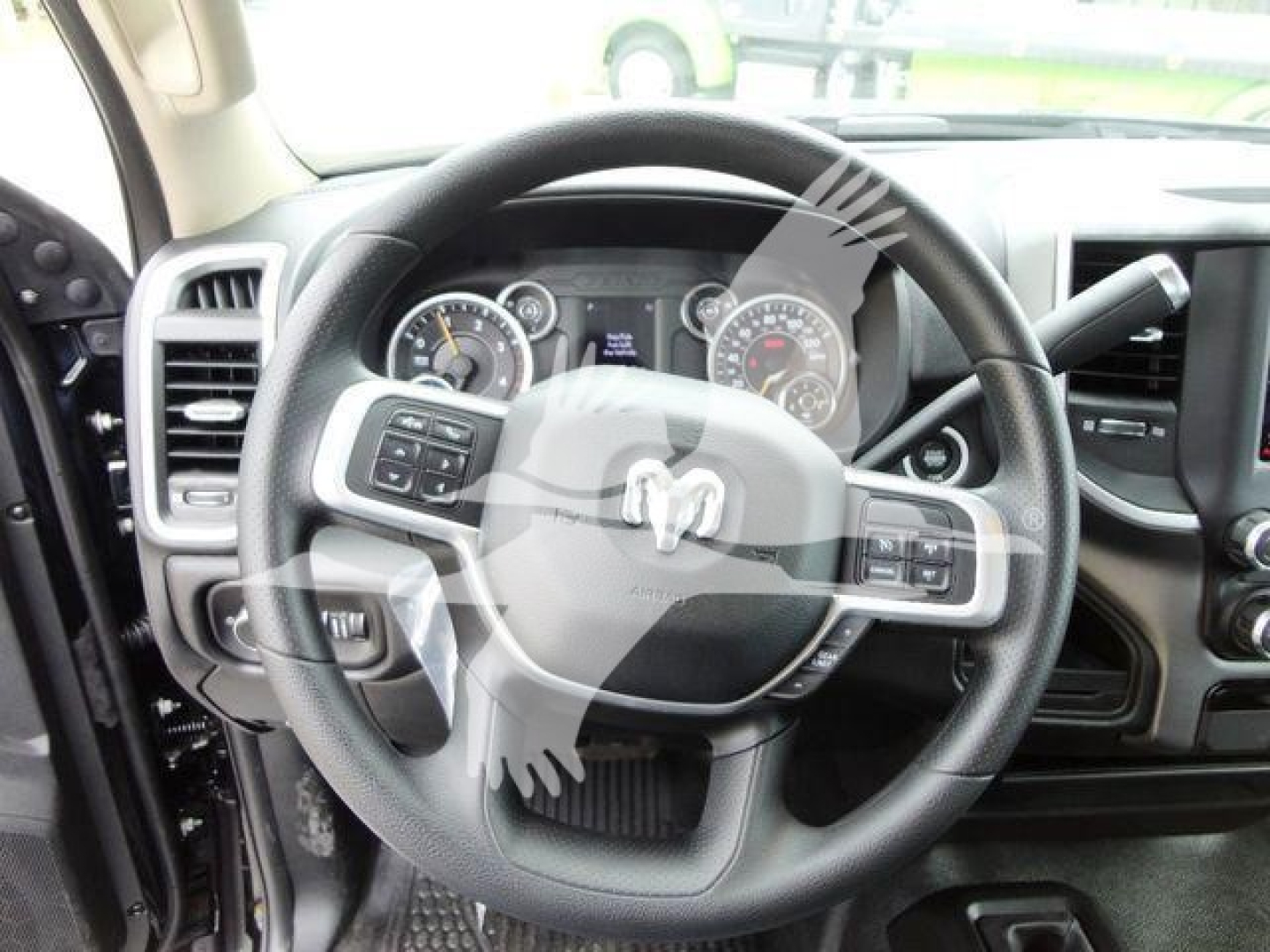 Ram 4500 interior showing steering wheel and dashboard with controls and instrument cluster.