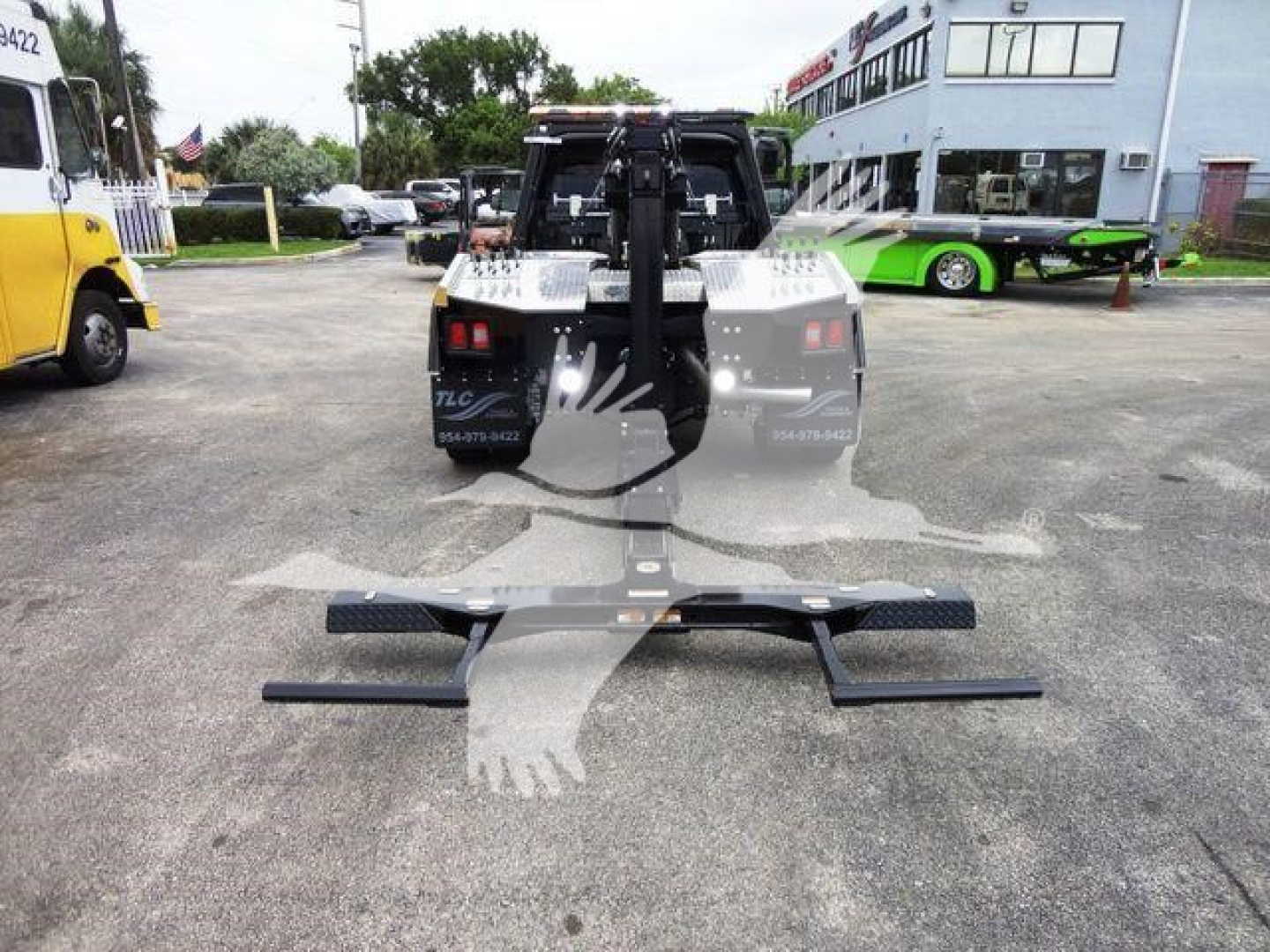 Ram 4500 SLT winch-equipped truck rear view showing heavy-duty winch setup and mounting hardware.