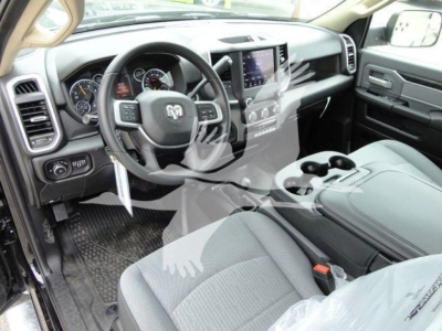 Ram 4500 SLT truck interior showing steering wheel, center console, and dashboard with infotainment screen.