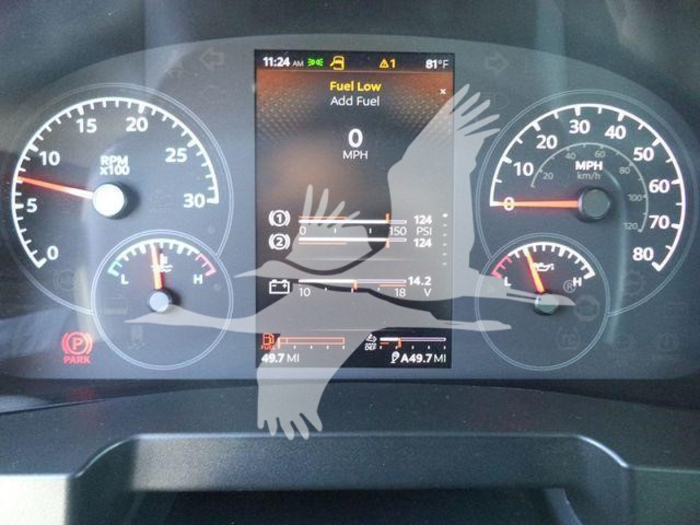 Instrument cluster of a Kenworth T280 dashboard showing fuel gauge, speedometer, tachometer, and digital display with fuel low warning and mileage readouts.