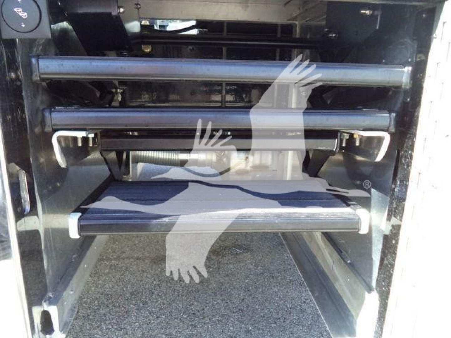 Truck entry stairs with metallic steps and side rails inside a Kenworth T280 cab access area.