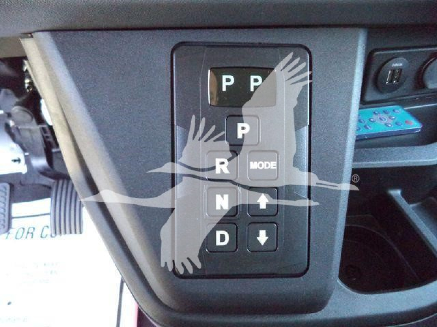 Kenworth T280 gear selector panel showing P R N D with mode button and up/down arrows