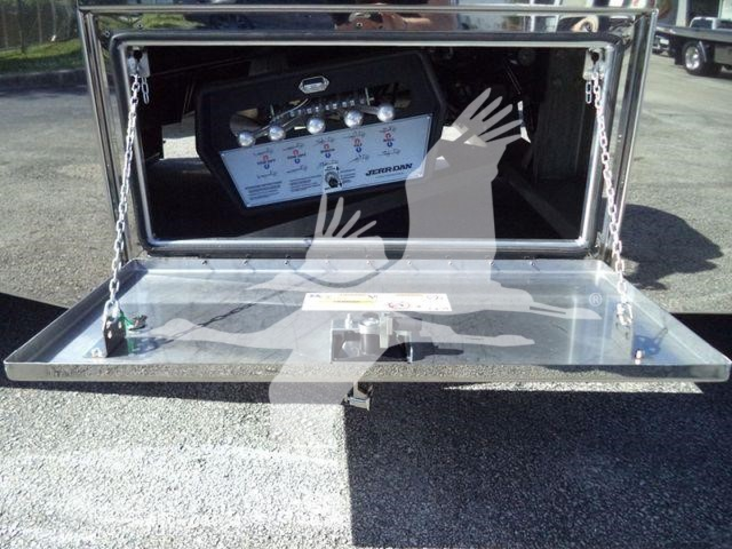 Kenworth T280 rollback truck tailgate with control panel and hydraulic unit visible inside the bed.