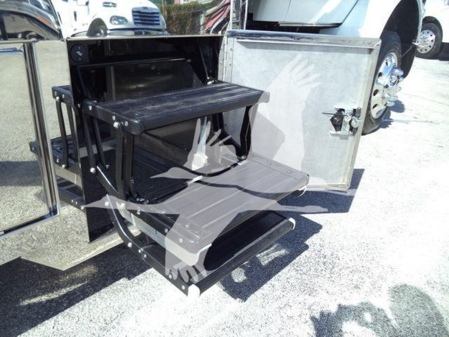 Kenworth T280 rollback truck with side step and storage pull-out drawer visible in open side compartment.