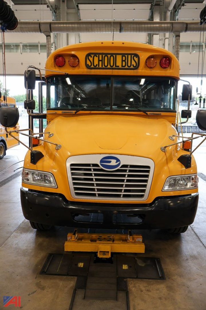 2018 Blue Bird Vision school bus front view showing yellow body, grille, headlights, and 'SCHOOL BUS' sign above windshield.
