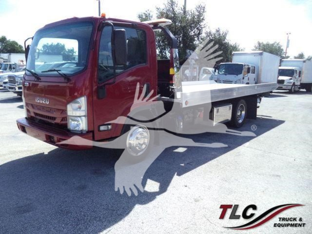 Isuzu NPR XD rollback tow truck showing flatbed cargo area and red cab with front grille and windshield; stock number T00603FM.