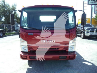 Isuzu NPR XD rollback truck front view showing Isuzu emblem and windshield with side mirrors; red cab with headlights and grille.