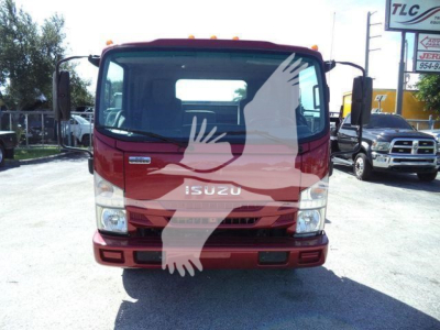 Isuzu NPR XD rollback truck front view with Isuzu logo on grille; red cab with large windshield and side mirrors.