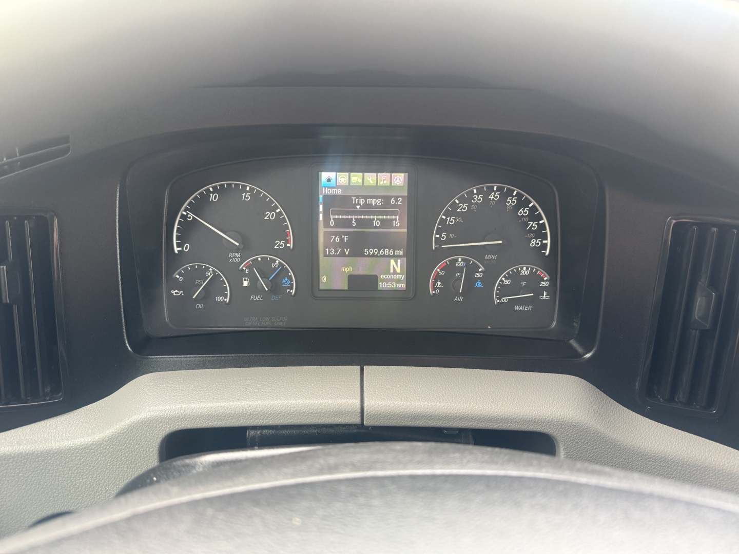 Dashboard of 2021 Freightliner Cascadia 126 showing instrument cluster and central information display.