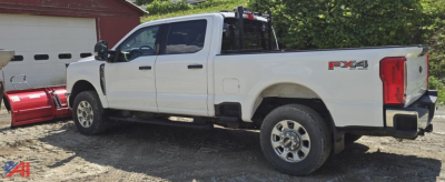 Ford F-350 Super Duty Crew Cab 4x4 pickup with plow mount and sliding rear window, white exterior, FX4 badge, extended cab,”