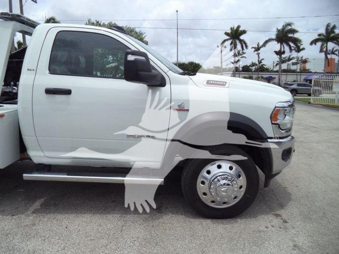 Ram 4500 SLT truck side view with winch category, stock number J98294FM and new condition.