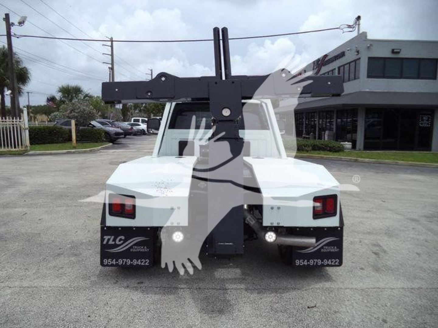 Ram 4500 tow truck chassis rear view with winch carrier and dual taillights.