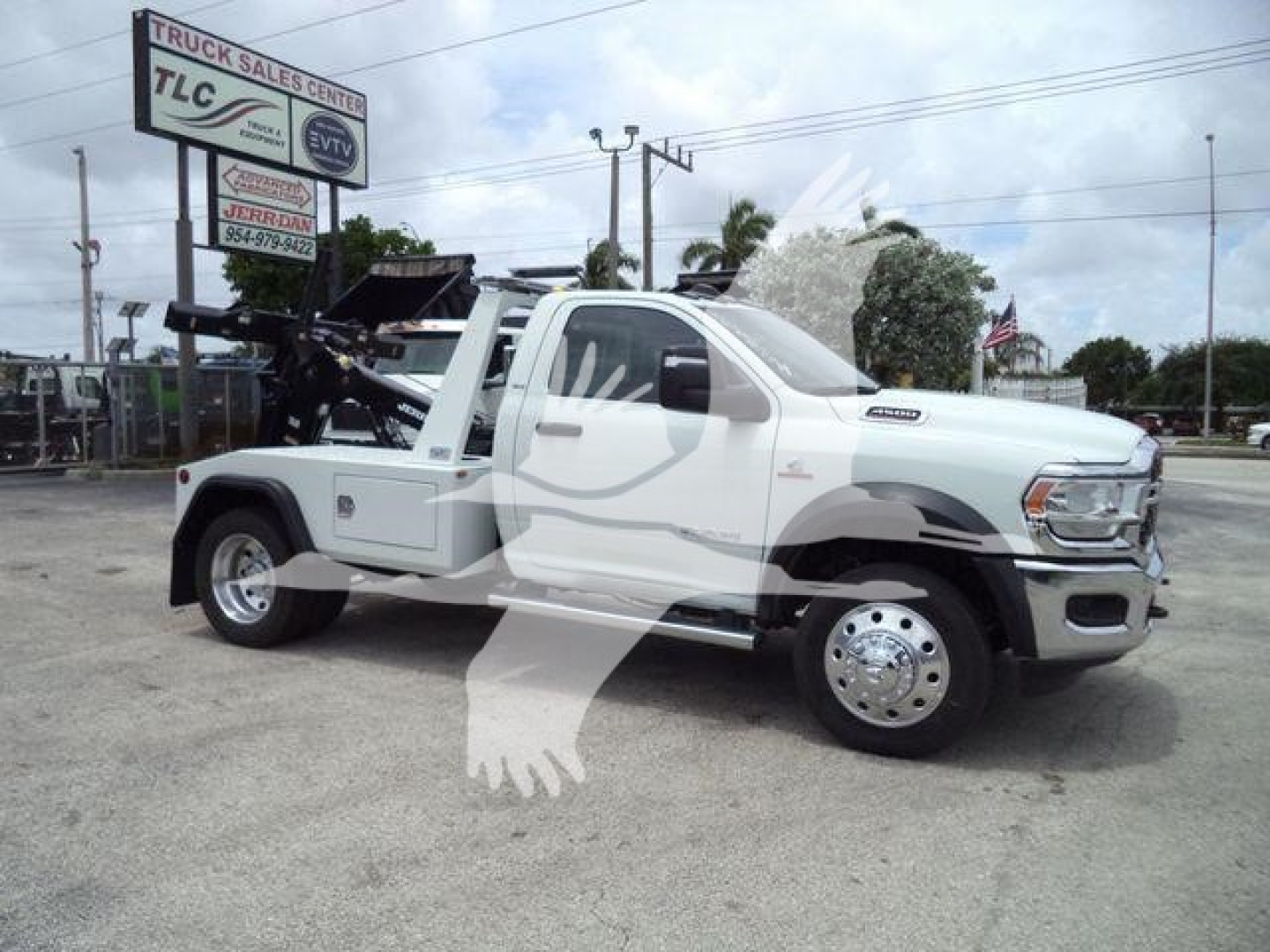 Ram 4500 Towing/Winch truck side view showing front chrome bumper, dual rear wheels, and winch mounting at bed.