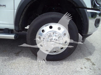 Ram 4500 front wheel showing chrome hubcap and tire detail with wheel well