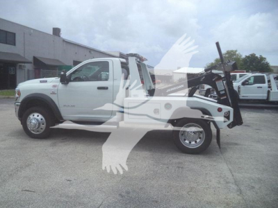 Ram 4500 SLT tow truck with wheel-lift in side view, white exterior, stock number J98294FM, winch category.