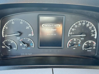 Freightliner Cascadia instrument cluster showing gauges and center display with Freightliner Run Smart logo and 456,509 mi.