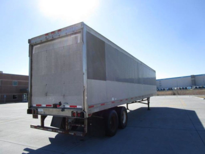 Utility van trailer showing side panel and rear with wheels visible