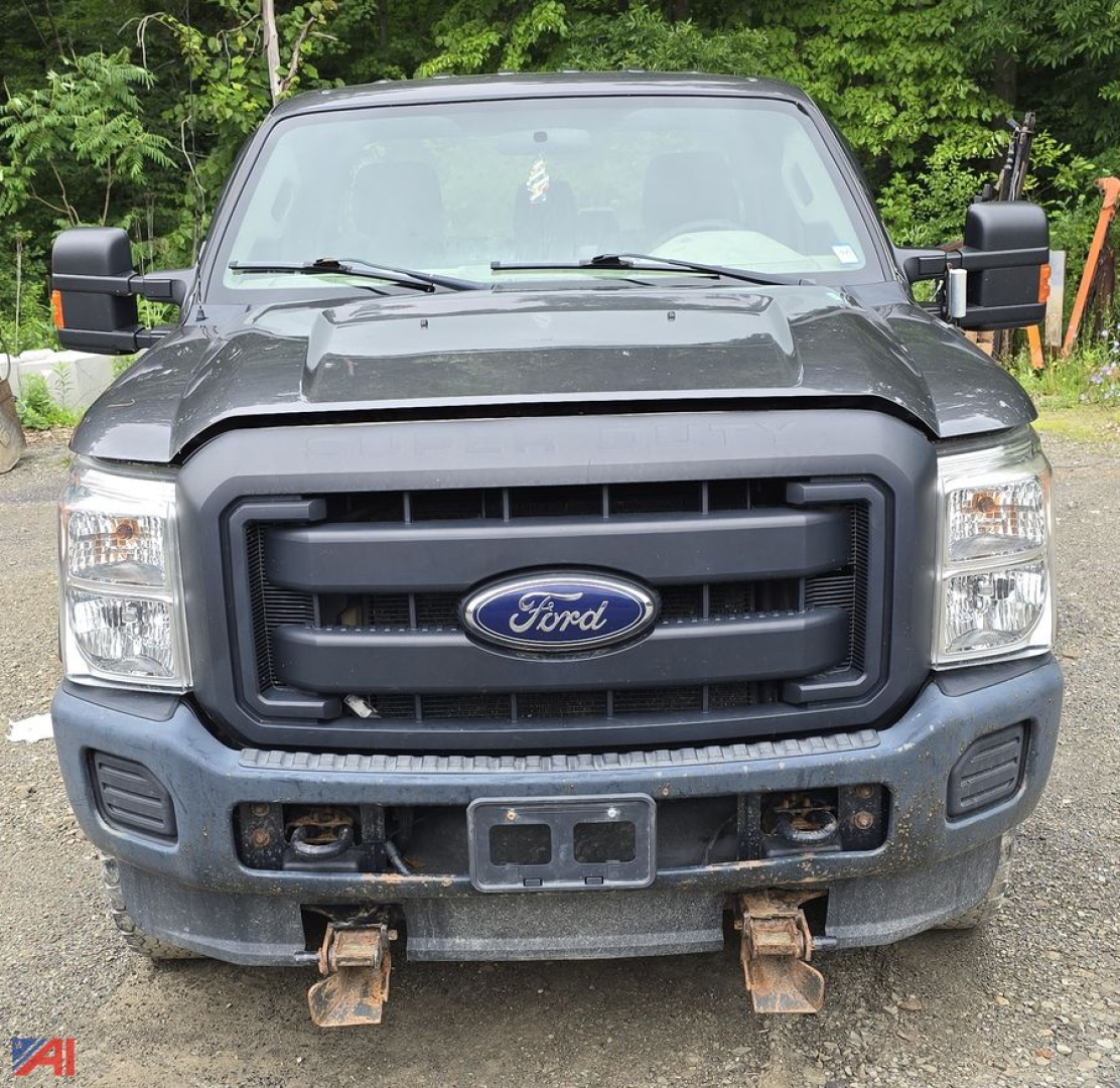 Front view of a 2016 Ford F-250 Super Duty pickup with plow setup showing Ford oval grille and front bumper area.