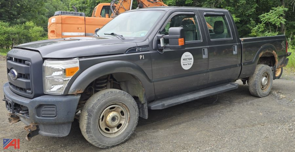 2016 Ford F-250 Super Duty pickup truck with plow, crew cab, black exterior, utility logo on front door, running boards, heavy-duty tires.
