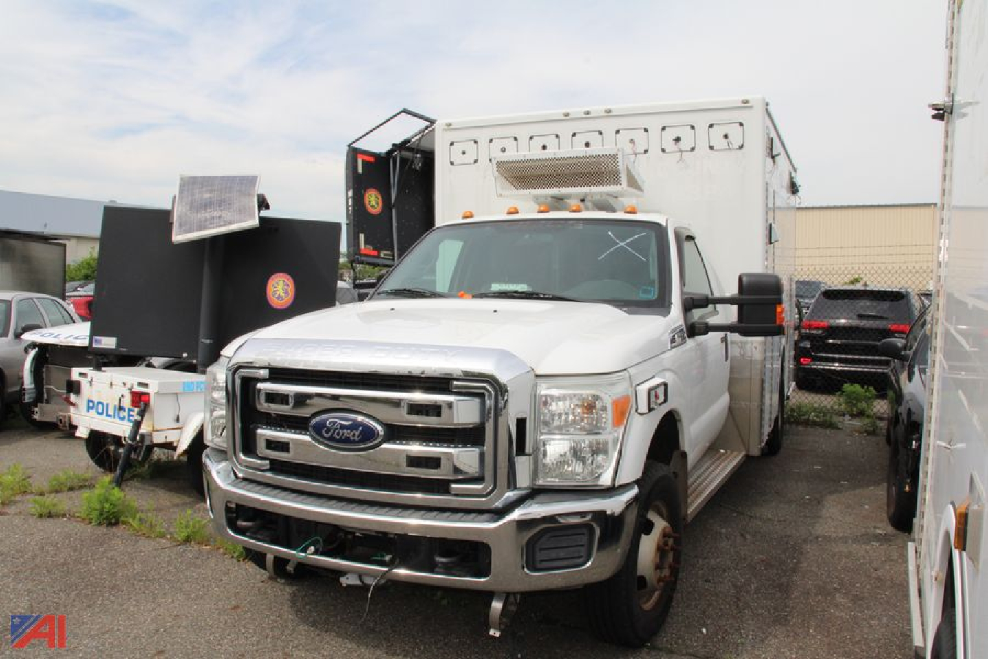 Ford F-350 Super Duty ambulance front view showing utility compartments and brush bumper.