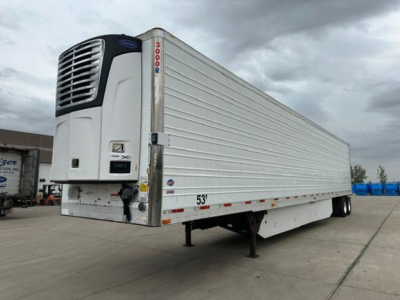 Refrigerated trailer showing Thermo King unit at nose and white corrugated body with 53' length.