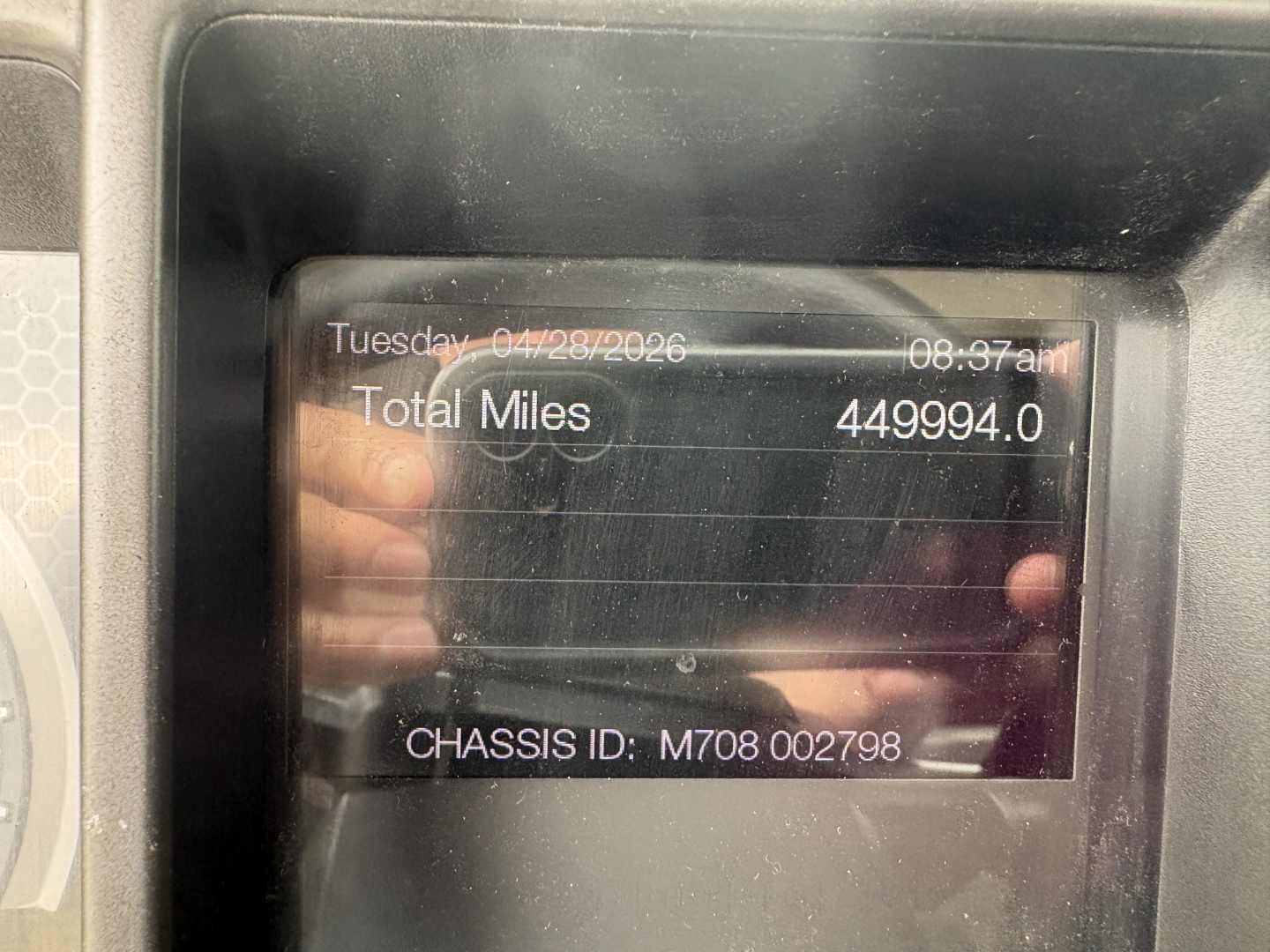 Mack AN42T dash display showing total miles 449,994.0 and chassis ID M708 002798.