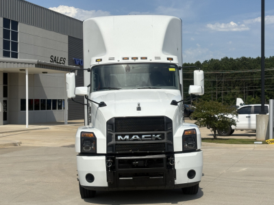 Truck front view of 2022 Mack AN42T conventional daycab with white exterior and black grille, showing Mack lettering on the grille and large headlights.