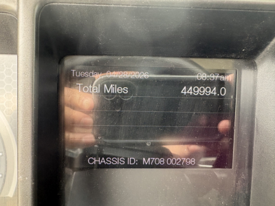 Mack AN42T dash display showing total miles 449,994.0 and chassis ID M708 002798.