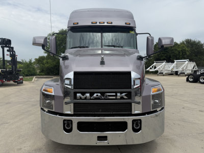 Mack AN64T70 conventional sleeper truck front view showing large grille with MACK lettering, chrome bumper, and dual headlights.