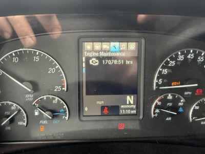 Dashboard of a 2021 Freightliner Cascadia 126 showing engine maintenance screen reading 170,785 hours and various gauges including RPM, speed, fuel, DEF, and air pressure.