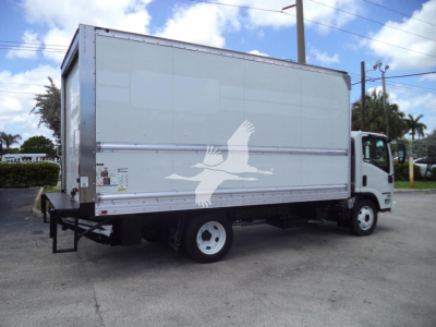 Isuzu NPR HD box truck side view showing cargo box with bird logo and white cab.