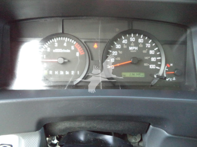 Isuzu NPR-HD dashboard view showing speedometer up to 100 mph, tachometer, and odometer reading 179,? with gear indicator and warning lights.