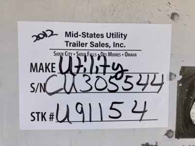 Trailer sticker with MID-STATES UTILITY TRAILER SALES INC. header and handwritten stock, S/N, and year. Visible text includes: ‘2012’ handwritten, 'Mid-States Utility Trailer Sales, Inc.', locations 'Sioux City · Sioux Falls · Des Moi