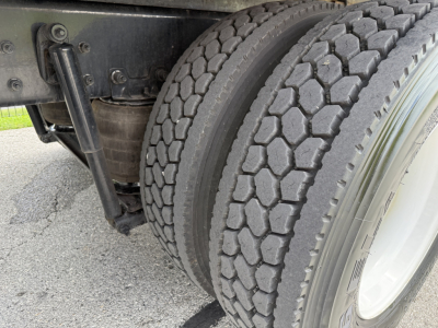Kenworth T380 trailer with dual rear wheels showing tire treads and suspension.