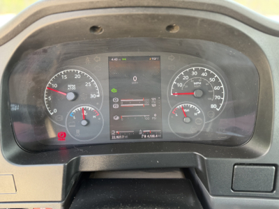 Kenworth T280 dashboard showing instrument cluster with speedometer, tachometer, and digital display; central screen shows various icons and trip data.