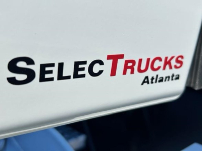 SelecTrucks Atlanta badge on a white truck surface.