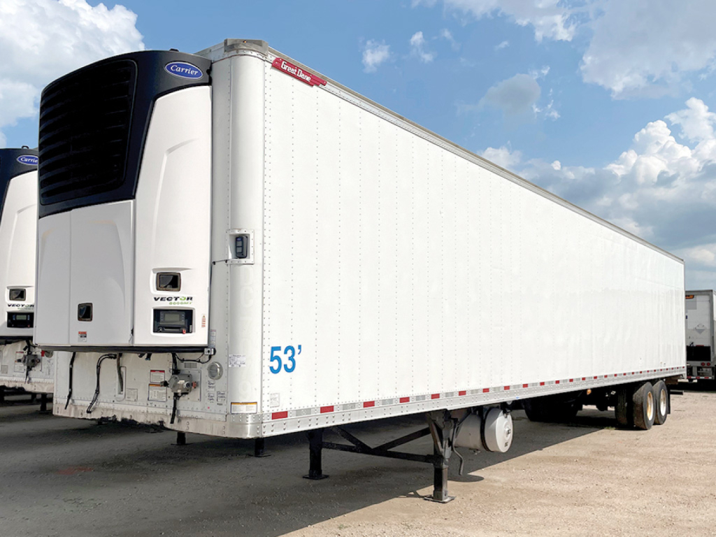 Great Dane multi-temperature reefer trailer with white body, 53' length, front refrigeration unit, landing gear, tandem rear axles, visible VIN 1GRAA0627HE700581 on listing image.