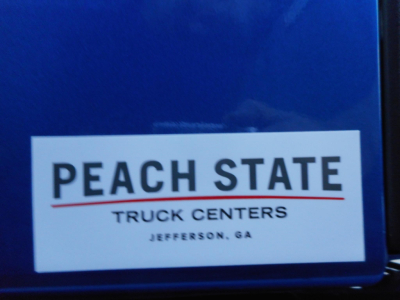 Sticker on blue vehicle showing 'PEACH STATE TRUCK CENTERS JEFFERSON, GA'