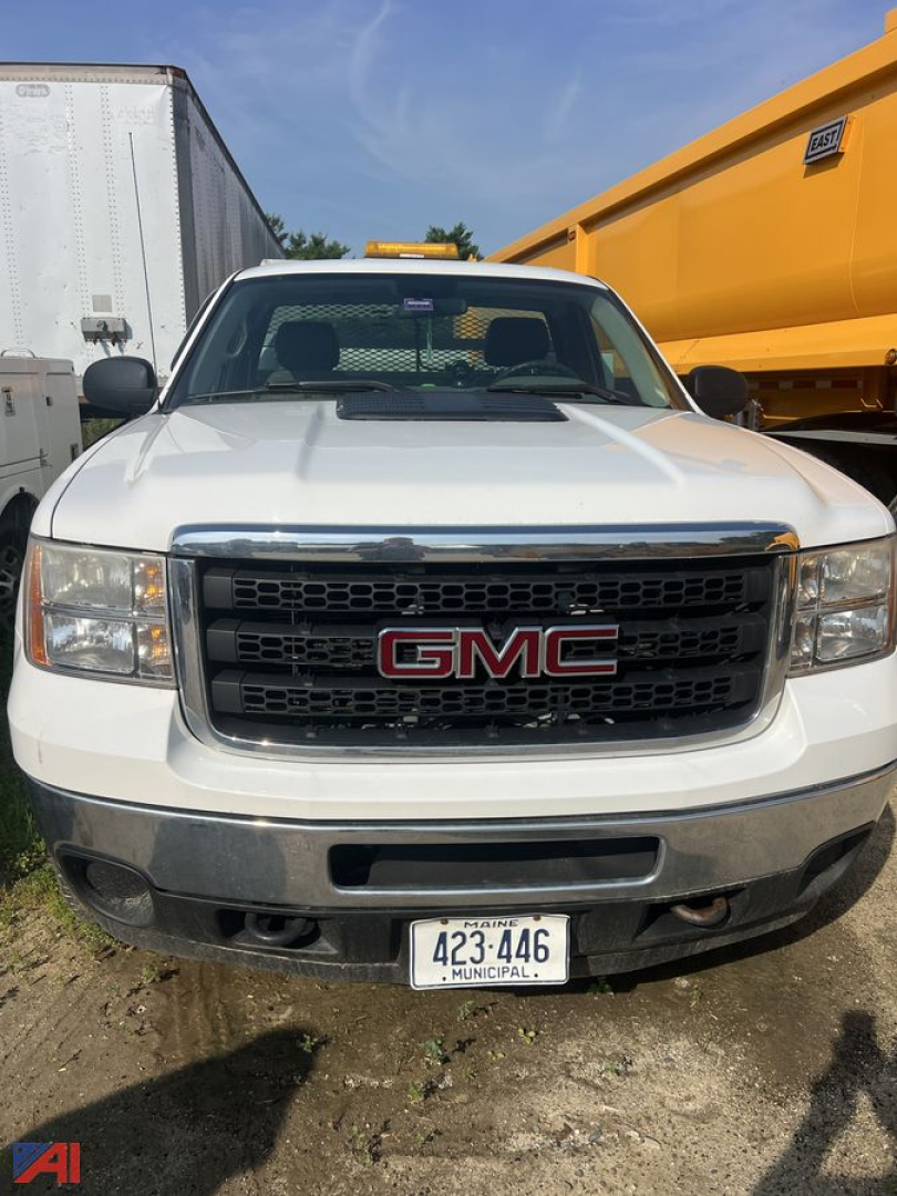 GMC Sierra 2500HD utility truck front view showing GMC grille and bumper with Utah license plate.
