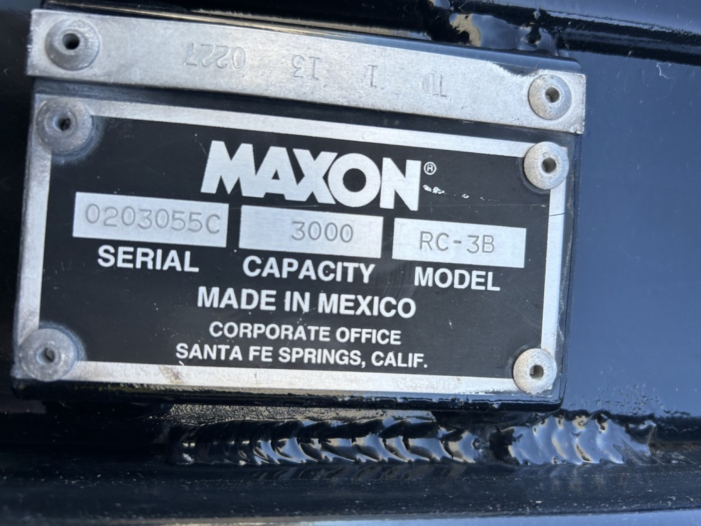 Maxon serial plate on truck showing MAY 2000? RC-3B model, capacity 3000, serial 0203055C. Made in Mexico, corporate office Santa Fe Springs, CA.