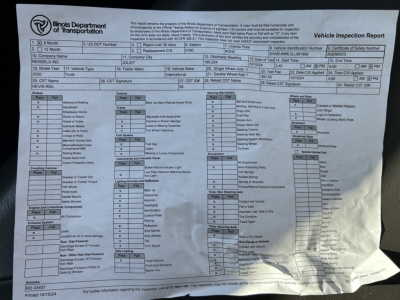 Vehicle inspection report sheet with fields and checkboxes for a 2020 International MV box truck. Includes VIN 3HAEUMML3LL081892, inspection data boxes, and various vehicle attribute sections.