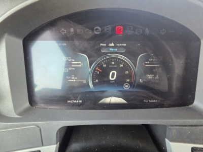 Kenworth T680 dash cluster showing digital speedometer at 0 mph, fuel and engine gauges, warning icons, and odometer reading 343,964 miles.