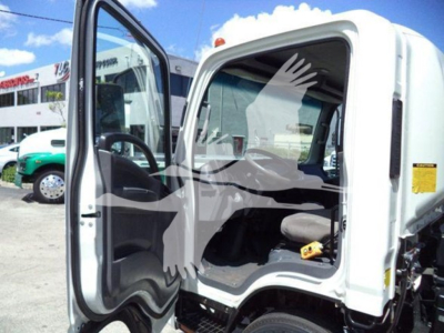 Isuzu NRR cab interior and driver door area visible in a white truck with open door.