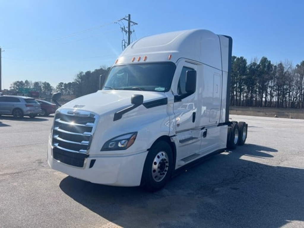 Freightliner Cascadia 126 conventional sleeper truck in white, front three-quarter view, no visible cargo.