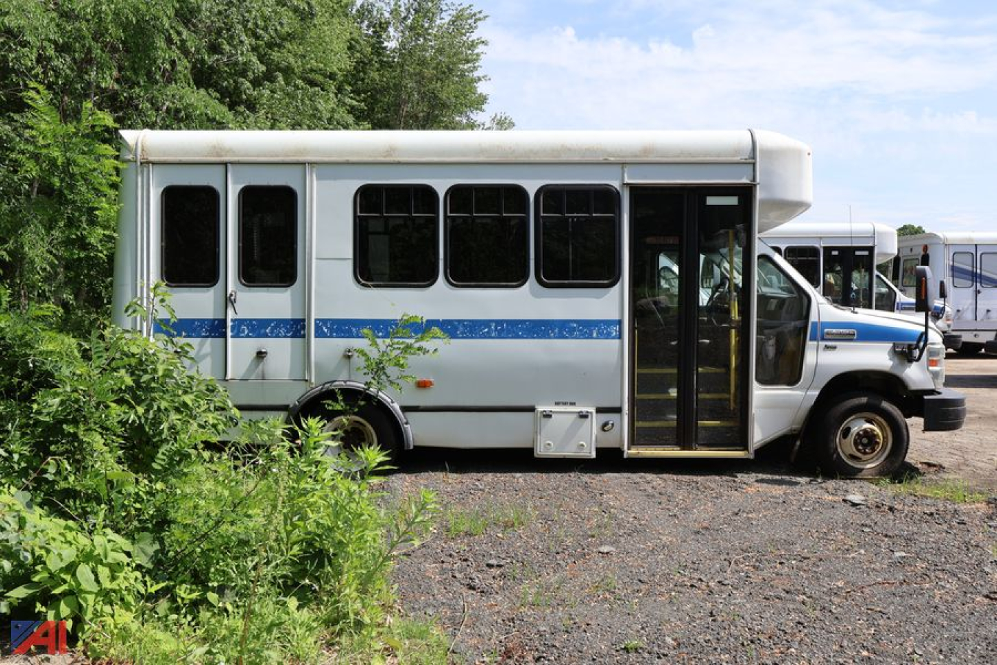  Ford E350 wheelchair bus side view showing passenger doors and windows