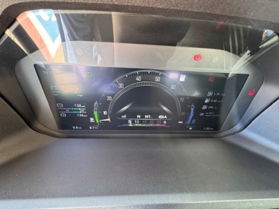 Mack PR64T gauge dashboard with digital driver display showing speedometer and vehicle status indicators.