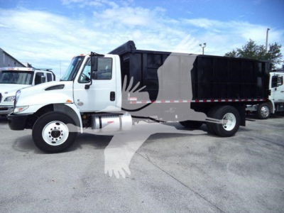 White 2019 International 4300 dump truck with black dump bed, side view showing cab and wheels, no visible text on the vehicle surfaces.